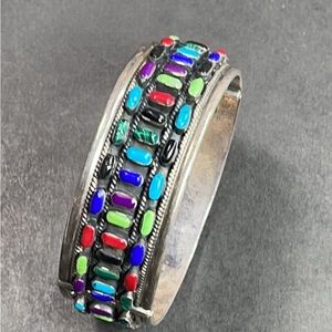 sterling silver bangle with multiple stones